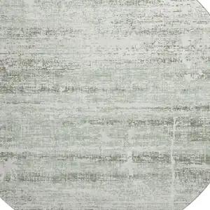 Photo of 8' Sage And Ivory Abstract Washable Round Rug With UV Protection