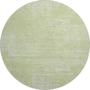 Photo of 8' Sage And Ivory Abstract Washable Round Rug With UV Protection
