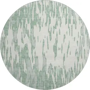 Photo of 8' Sage And Ivory Abstract Washable Round Rug With UV Protection