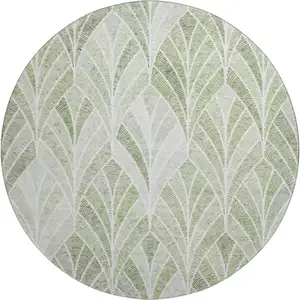 Photo of 8' Sage And Ivory Geometric Washable Round Rug With UV Protection