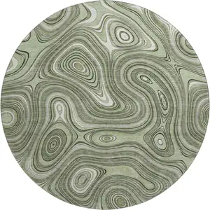Photo of 8' Sage And Ivory Geometric Washable Round Rug With UV Protection