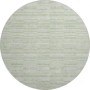 Photo of 8' Sage And Ivory Striped Washable Round Rug With UV Protection