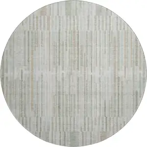 Photo of 8' Sage And Ivory Striped Washable Round Rug With UV Protection
