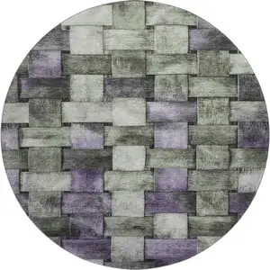 Photo of 8' Sage And Lavender Striped Washable Round Rug With UV Protection