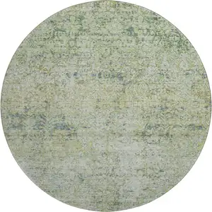 Photo of 8' Sage And Olive Green Abstract Washable Round Rug With UV Protection