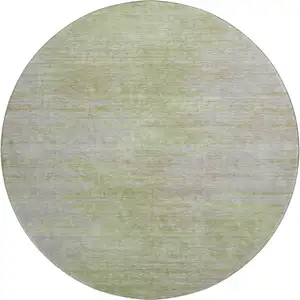 Photo of 8' Sage And Taupe Abstract Washable Round Rug With UV Protection