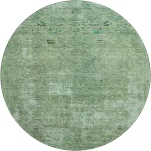 Photo of 8' Sage And Teal Abstract Washable Round Rug With UV Protection