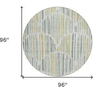 Photo of 8' Sage Artichoke Green And Gold Round Abstract Washable Indoor Outdoor Area Rug