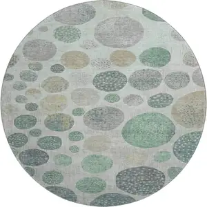 Photo of 8' Sage Beige And Tan Geometric Washable Round Rug With UV Protection