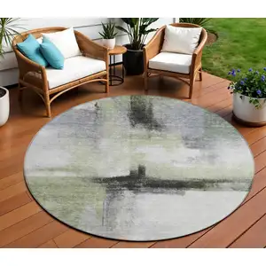 Photo of 8' Sage Black And Gray Round Abstract Washable Indoor Outdoor Area Rug