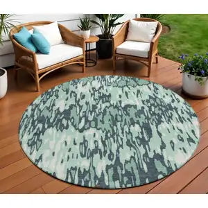 Photo of 8' Sage Black And Ivory Round Striped Washable Indoor Outdoor Area Rug
