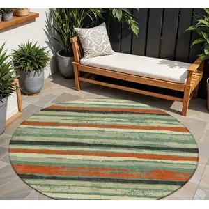 Photo of 8' Sage Black And Red Round Striped Washable Indoor Outdoor Area Rug