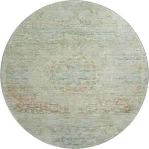 Photo of 8' Sage Blue And Copper Floral Medallion Washable Round Rug With UV Protection