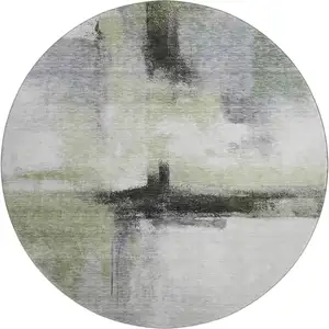 Photo of 8' Sage Charcoal And Ivory Abstract Washable Round Rug With UV Protection