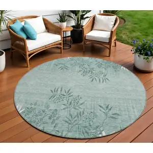 Photo of 8' Sage Fern Green And Ivory Round Floral Washable Indoor Outdoor Area Rug