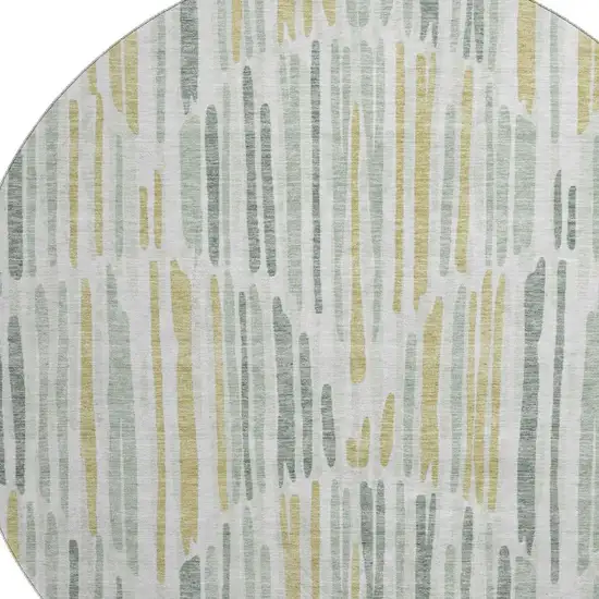 8' Sage Gold And Ivory Abstract Washable Round Rug With UV Protection Photo 3