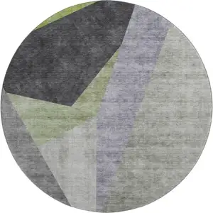 Photo of 8' Sage Gray And Ivory Geometric Washable Round Rug With UV Protection