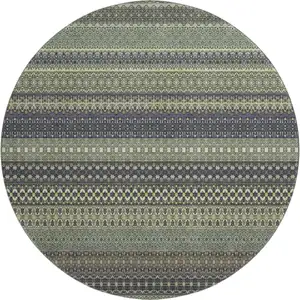Photo of 8' Sage Gray And Ivory Striped Washable Round Rug With UV Protection