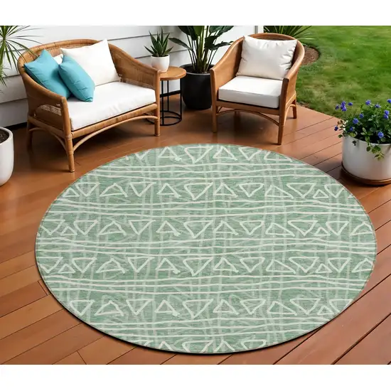 8' Sage Green And Ivory Round Geometric Washable Indoor Outdoor Area Rug Photo 1