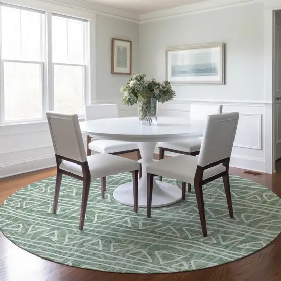 8' Sage Green And Ivory Round Geometric Washable Indoor Outdoor Area Rug Photo 6