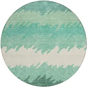 Photo of 8' Sage Green And Ivory Round Striped Washable Indoor Outdoor Area Rug