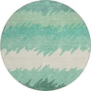 Photo of 8' Sage Green And Ivory Round Striped Washable Indoor Outdoor Area Rug