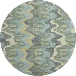 Photo of 8' Sage Ivory And Beige Abstract Washable Round Rug With UV Protection