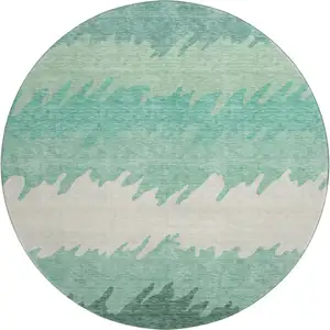 Photo of 8' Sage Ivory And Emerald Striped Washable Round Rug With UV Protection