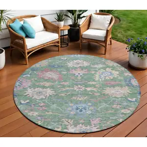 Photo of 8' Sage Ivory And Pink Round Floral Washable Indoor Outdoor Area Rug