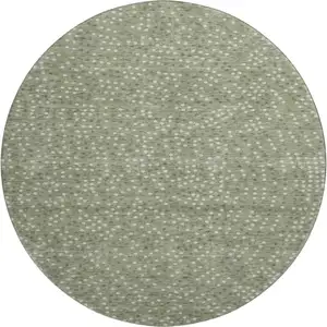 Photo of 8' Sage Ivory And Taupe Polka Dot Washable Round Rug With UV Protection
