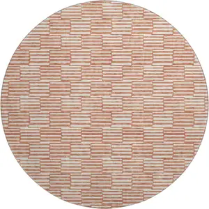Photo of 8' Salmon And Beige Abstract Geometric Washable Round Rug With UV Protection