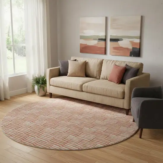 8' Salmon And Beige Abstract Geometric Washable Round Rug With UV Protection Photo 1