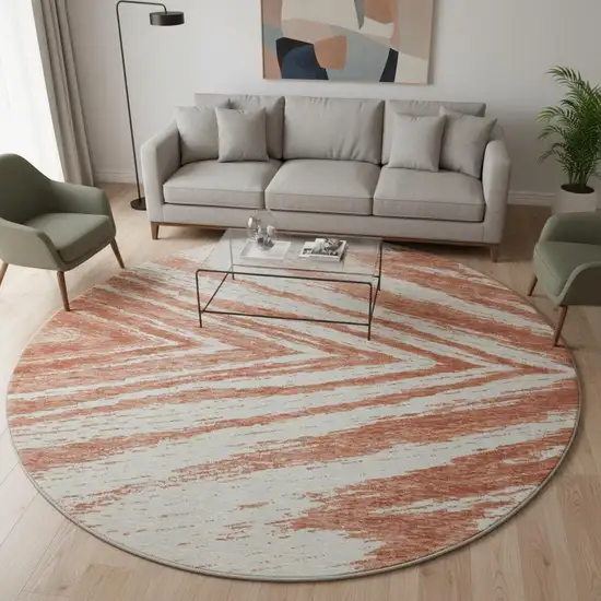 8' Salmon And Beige Abstract Washable Round Rug With UV Protection Photo 2