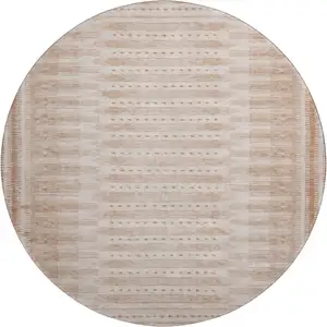Photo of 8' Salmon And Beige Geometric Washable Round Rug With UV Protection