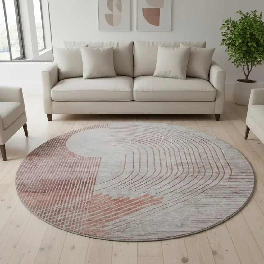 8' Salmon And Beige Geometric Washable Round Rug With UV Protection Photo 1