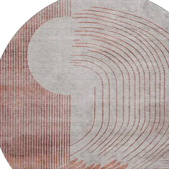 8' Salmon And Beige Geometric Washable Round Rug With UV Protection Photo 3