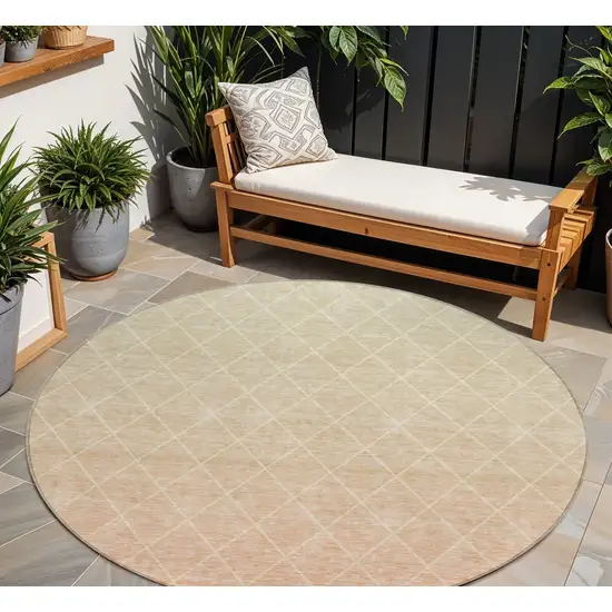 8' Salmon And Beige Round Geometric Washable Indoor Outdoor Area Rug Photo 1