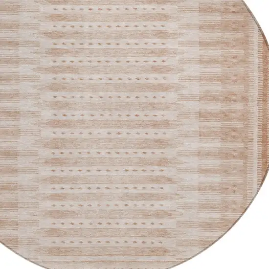 8' Salmon And Beige Round Geometric Washable Indoor Outdoor Area Rug Photo 9