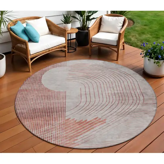 8' Salmon And Beige Round Geometric Washable Indoor Outdoor Area Rug Photo 2