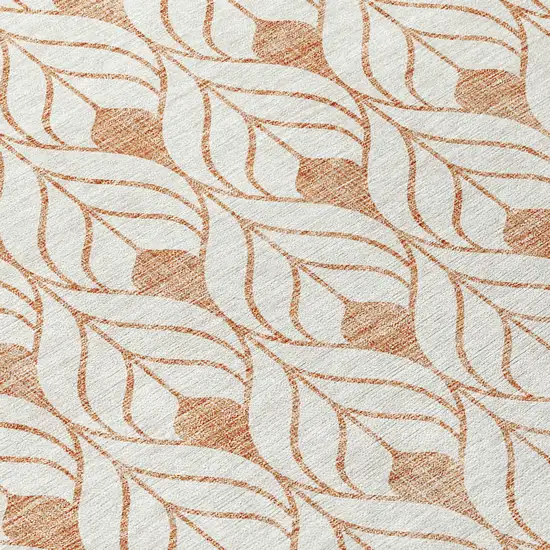 8' Salmon And Beige Round Geometric Washable Indoor Outdoor Area Rug Photo 8