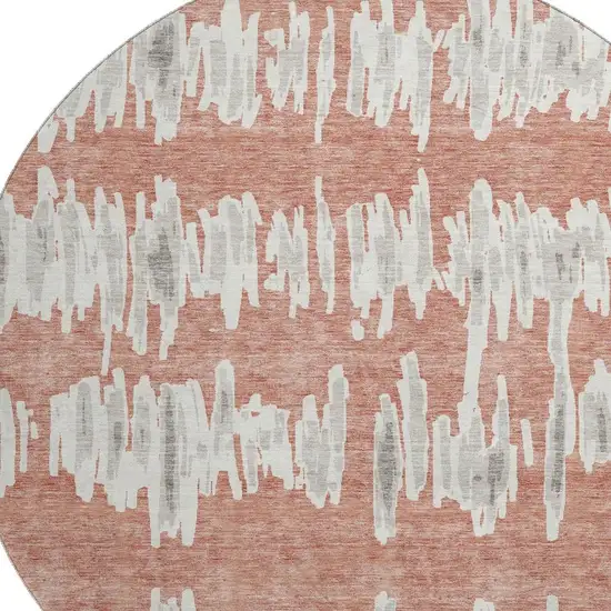 8' Salmon And Beige Striped Washable Round Rug With UV Protection Photo 3