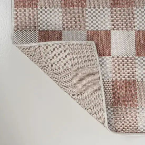 8' Salmon And Cream Geometric Indoor Outdoor Runner Rug Photo 8