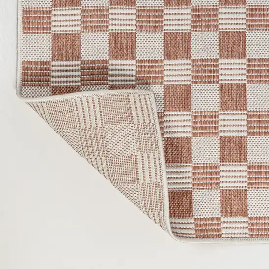 8' Salmon And Cream Geometric Indoor Outdoor Runner Rug Photo 4