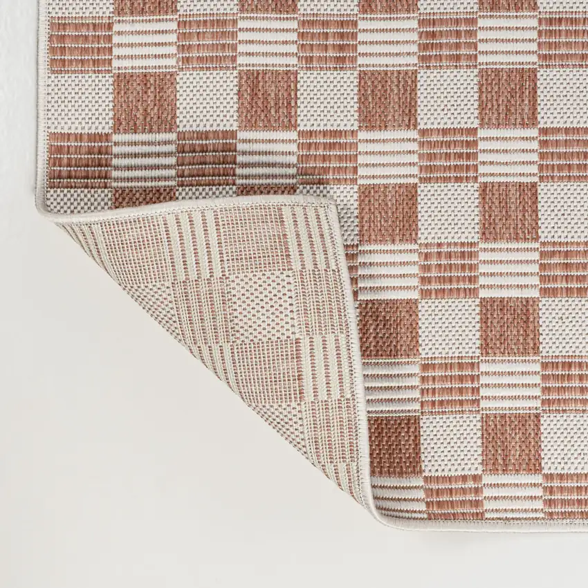 8' Salmon And Cream Geometric Indoor Outdoor Runner Rug Photo 4