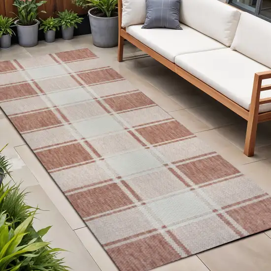 8' Salmon And Cream Gingham Indoor Outdoor Runner Rug Photo 1