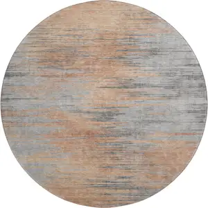 Photo of 8' Salmon And Gray Abstract Washable Round Rug With UV Protection