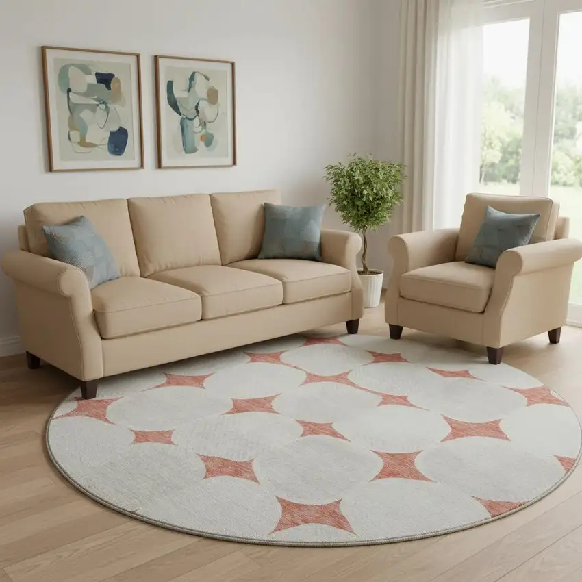 8' Salmon And Ivory Abstract Geometric Washable Round Rug With UV Protection Photo 1