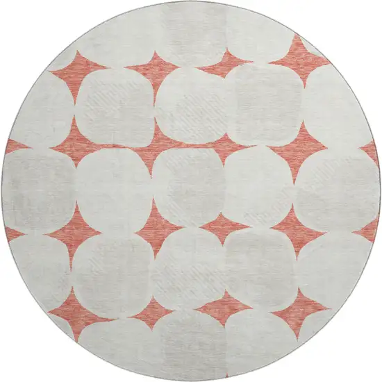 8' Salmon And Ivory Abstract Geometric Washable Round Rug With UV Protection Photo 1