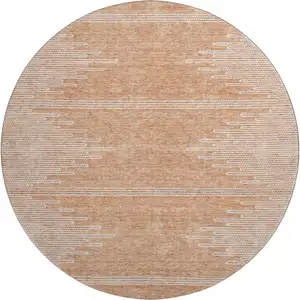 Photo of 8' Salmon And Ivory Abstract Washable Round Rug With UV Protection