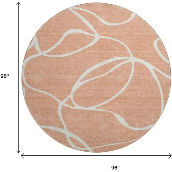 8' Salmon And Ivory Abstract Washable Round Rug With UV Protection Photo 9